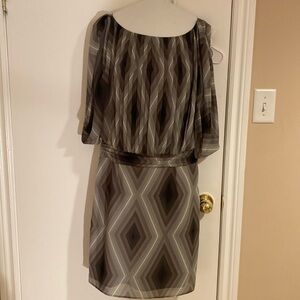 Stunning going out party dress with pleats and beautiful sleeves